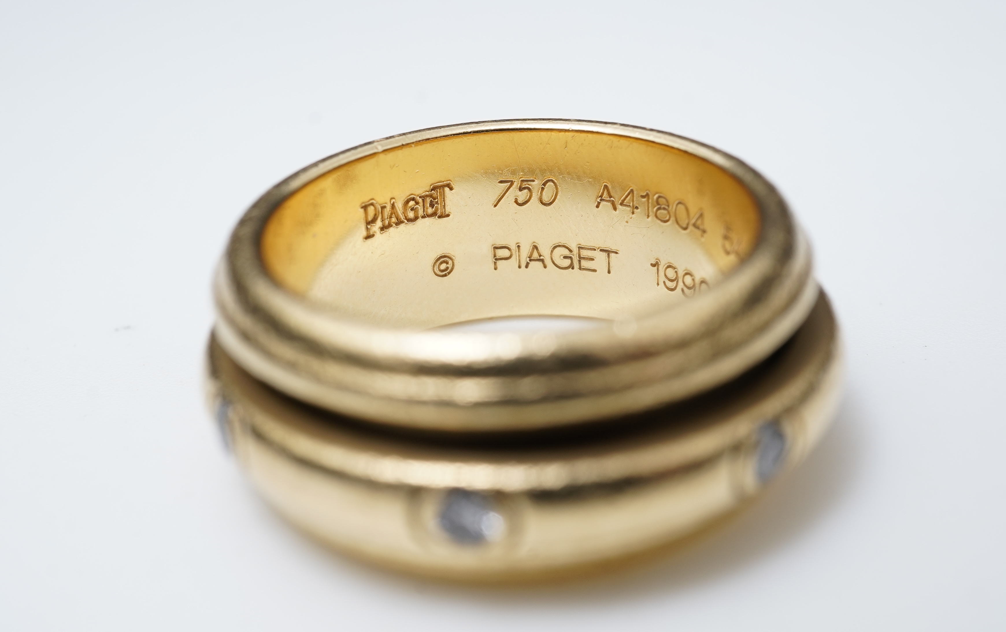 Piaget, a gold and diamond 'Possession' ring